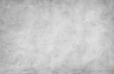 Textured gray concrete wall surface with visible plaster patterns and subtle tonal variations, ideal as a background or texture