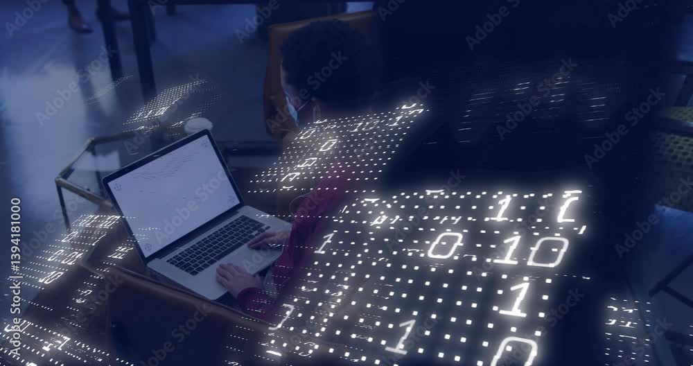 Aufkleber using laptop, person viewing binary code animation overlay in school setting