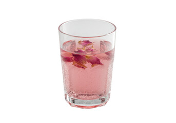 Refreshing pink beverage with flower petals in a glass on a clean surface