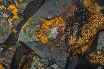 Mineral Cuprite and nugget copper crystals. Microphotography with high magnification- photo scale 10X