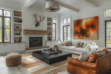 Modern farmhouse living room with white walls, fireplace, leather couches, and deer antlers. Light wood floors and abstract art.