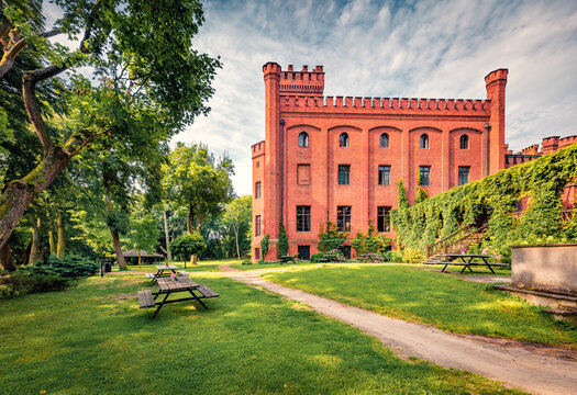 Stunning morning view of red bricks Jan III Sobieski Casttle. Majestic summer cityscape of Rzucewo village, district of Gmina Puck, within Puck County, Poland, Europe. Traveling concept background.