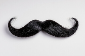 Exquisite Black Moustache with Curled Ends Grooming Elegance and Timeless Style Facial Hair Adornment