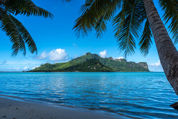 Scenic View of Maupiti Island from a Tropical Beach in French Polynesia
