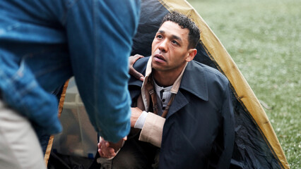 Homeless, poor and handshake with person for help with donation, compassion and empathy for...