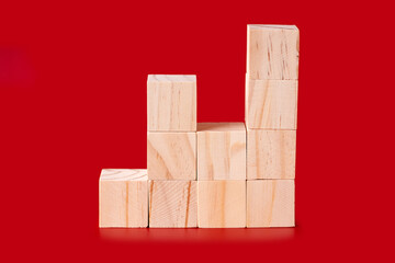 Wooden cubes on red
