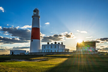 Sunset over Portland Bill Lighthouse, Portland Bill, Isle of Portland, Dorset, England