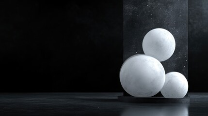 Minimalist scene with three white spheres on a dark surface