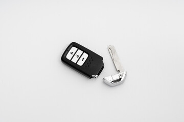 Car key with remote control isolated on white background.