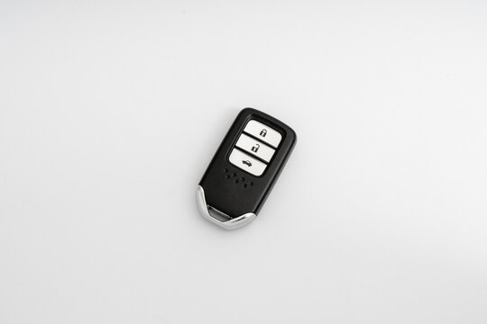 Car key with remote control isolated on white background.