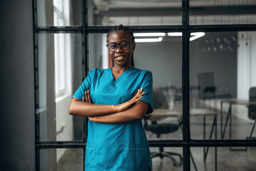 In the office clinic. Female doctor in coat