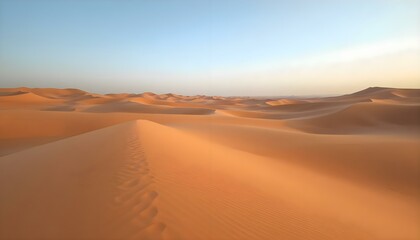 desert landscape with sand dunes and a blue sky
