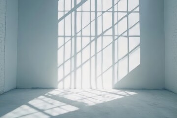 Obraz premium Bright, minimalist interior space with intricate light shadows cast by large windows