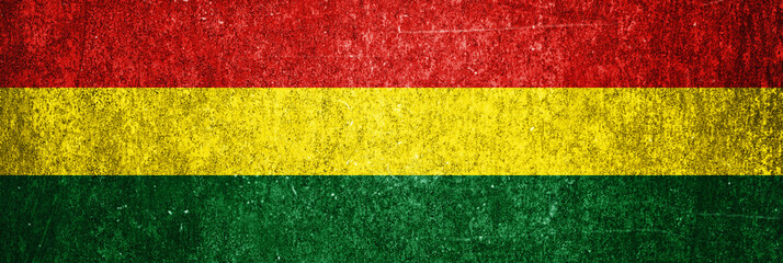 Bolivia state flag on a metal surface. Banner of dirty grunge Bolivia flag.