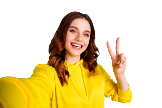 Photo of wavy cheerful cute nice charming fascinating millennial smiling toothily showing you v-sign taking selfie isolated over vivid turquoise color background