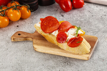 Bruschetta tapas with chorizo and tomato