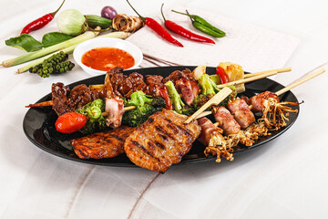 Asian grilled skewer assortment satay