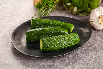Homemade lighty salted cucumbers with herbs
