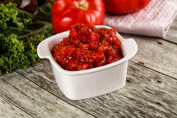 Diced ripe tomato with sauce