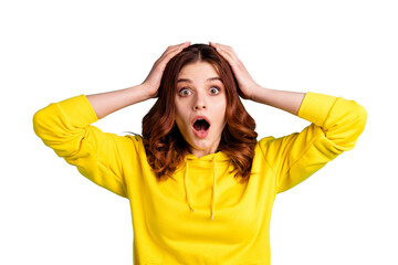 Photo of charming cute scared frightened girlfriend holding her head with hands staring with eyes...