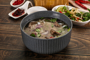 Vietnamese Pho Bo soup with beef and noodles