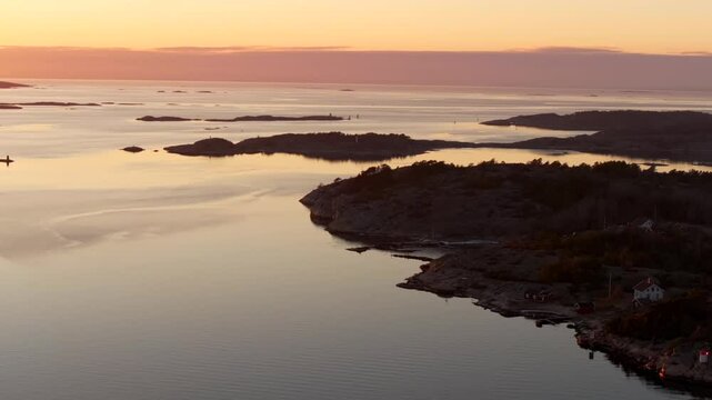 Str&ouml;mstad Stromstad Sweden aerial drone Scandinavia Arctic Circle islands golden sunset sun on horizon peaceful calm still Sandelfjord Fjord Skagerrak Baltic Sea marina harbor picturesque forward