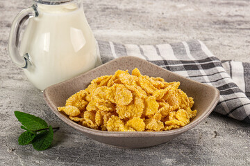 Corn flakes with milk for breakfast