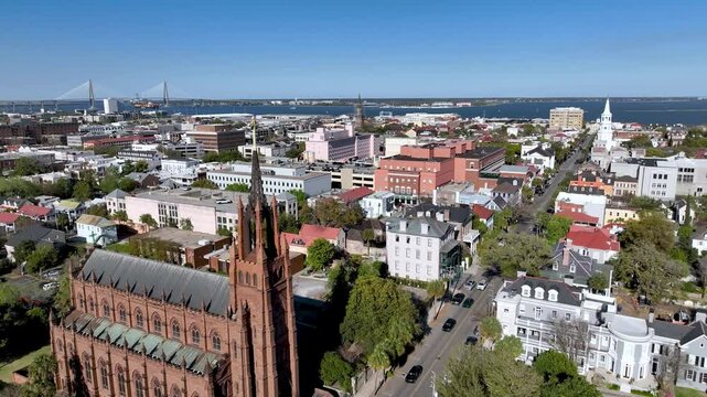 aerial tilt up from church to reveal charleston sc, south carolina