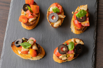  delicious Italian party appetizer featuring caprese crostini