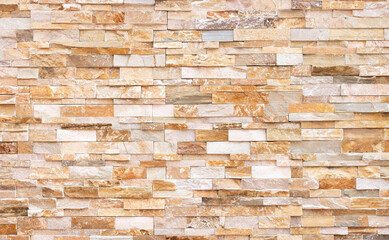 Natural Stone texture background. Beige brown color. Square rectangle shape in horizontal row stripe. Material for architectural decoration, wall cladding panel for facade, hotel, pool villa, resort.