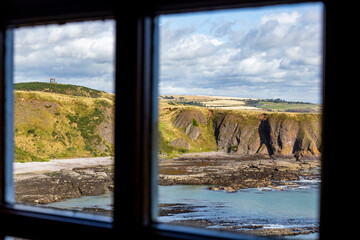 Dunnottar Castle rises in dramatic ruins atop a cliff overlooking the North Sea. Its breathtaking...