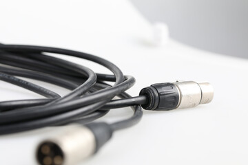 Audio cable connection studio environment product photography close-up view technology concept