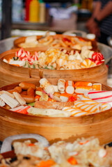 dim sum from top angle, Japanese street food, tempura and sushi in wooden box