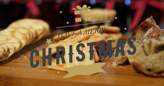 Merry Christmas text with festive animation over crackers and bread on table