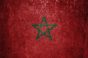 Naklejka premium Morocco State Flag. Dirty Morocco flag on metal surface.