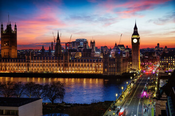 Elevated view of the illuminated Westminster Palace and Big Ben clock tower in London, England,...