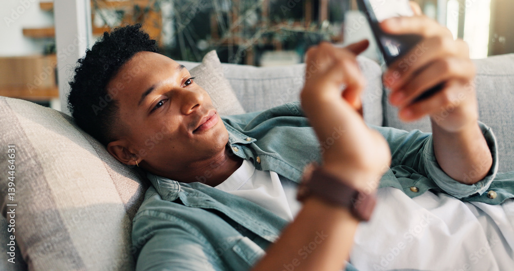 Leinwandbilder man, relax and scroll with phone on sofa for weekend break, dating site chat and app download. smile