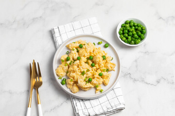Plate of tasty scrambled eggs, breakfast