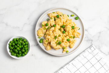 Plate of tasty scrambled eggs, breakfast