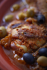 Chicken cooked with olives.