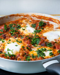 eggs and beans dinner in a pan close-up