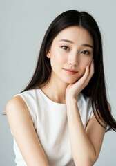 Portrait of a Young Woman with Smooth Skin and Dark Hair