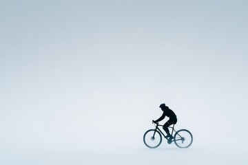Cyclist riding a bike in snow