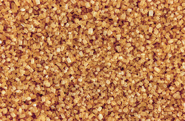 The texture of brown unrefined cane sugar