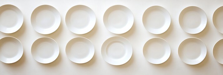 White Plates Arranged in Grid Pattern
