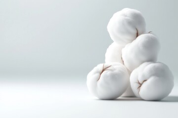 Fluffy white cotton bolls in a stack