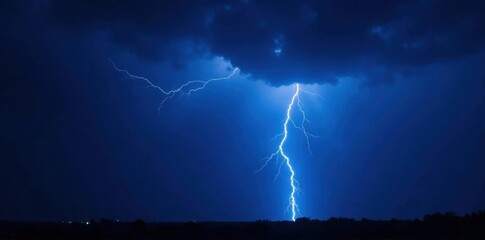 Vibrant blue lightning bolts illuminate the inky black sky , clouds, dramatic, sky