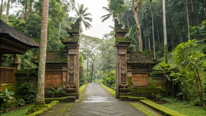 Fototapeta premium Serene entrance to a lush tropical forest with ornate stone gates.