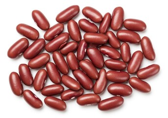 A scattered pile of kidney beans with a smooth texture on a plain white background surface close up shot
