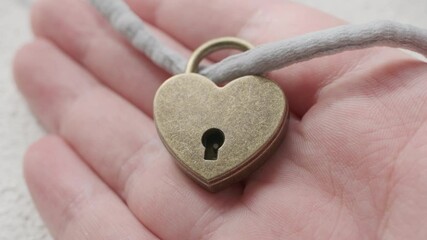 heart shaped lock close up and key